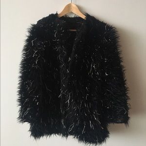 Vintage black and white feathered jacket.